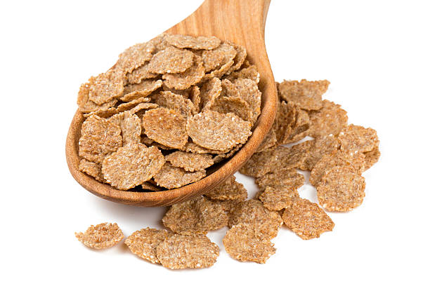 istock pile of bran flakes isolated on white 603862330