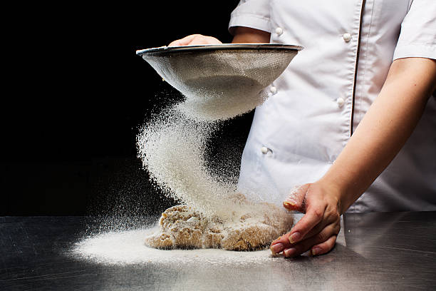 istock Woman hands kneading dough. 603862446