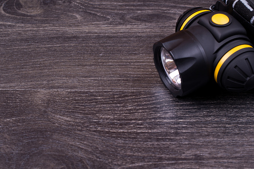 Small lamp on the head on a table