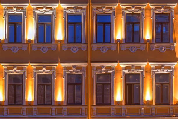 istock Windows on night facade of office building 603862682
