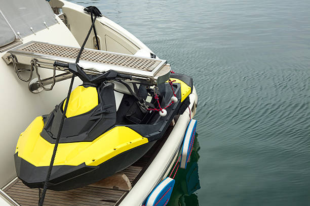 istock Jet ski placed on a boat at the sea 603863322