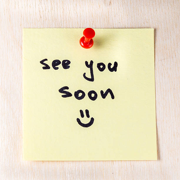 See you soon note on paper post it stock photo