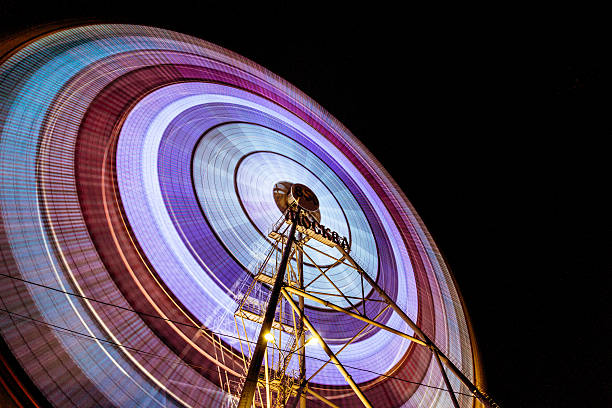 istock Big fairy panoramic wheel in Moscow park in motion 603867138