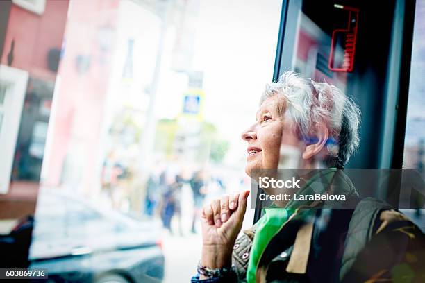 Senior Woman In The Bus Stock Photo - Download Image Now - Senior Adult, Bus, City