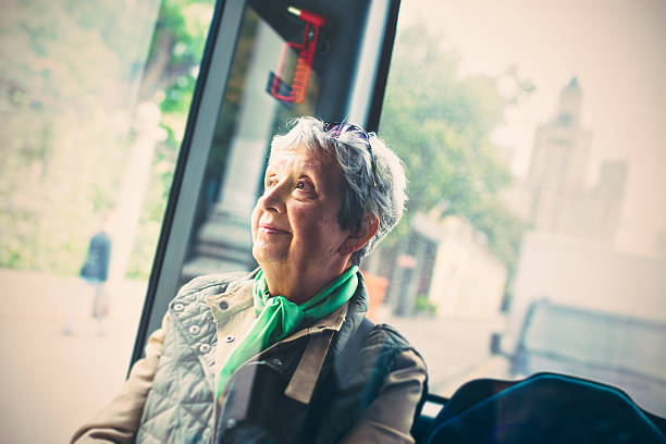 istock Senior woman in the bus 603869922