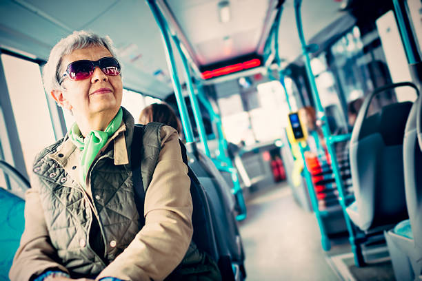 istock Senior woman in the bus 603870114