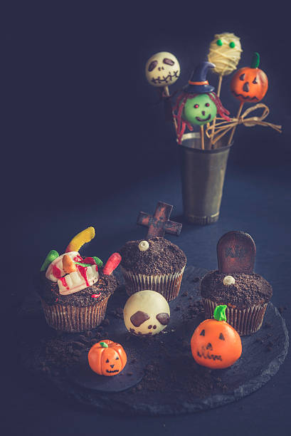 istock Funny Halloween cup cakes and cake pops 603870754