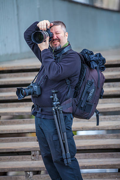 istock Professional Photographer taking photos 603873340