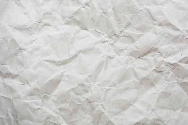 istock crumpled cream color tone paper pattern texture background 603882048