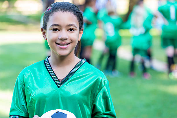 istock Beautiful young soccer player before soccer game 603886094
