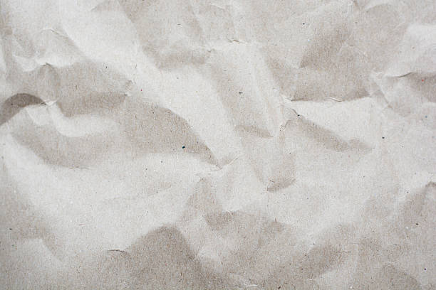 istock crumpled cream color tone paper pattern texture background 603895960