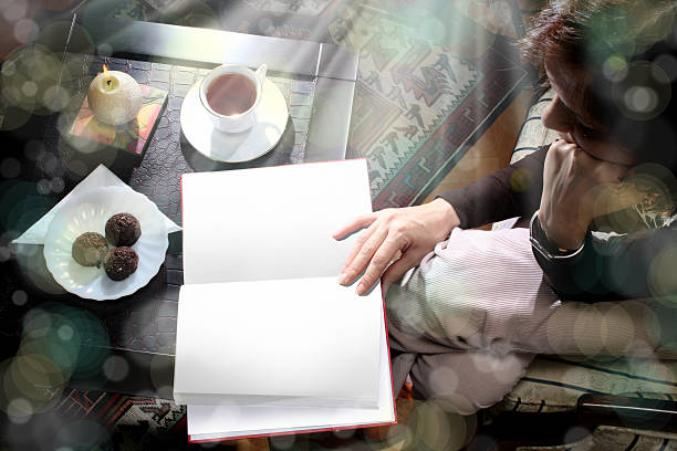 istock woman reading indoor 603898462