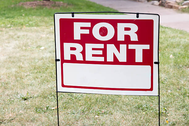istock For Rent sign posted on a yard 603899034