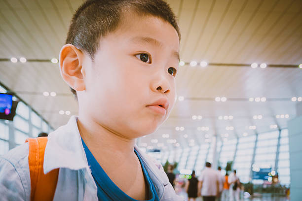 istock Young boy in airport 603900206