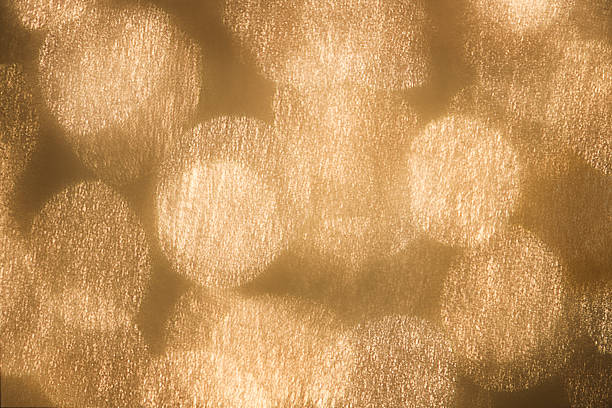 istock Glittery, Metallic-Gold Textured Lights Confetti Abstract Background 603901980