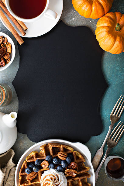 istock Pumpkin waffles with whipped cream for breakfast 603903576