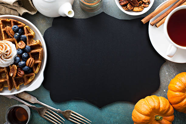 istock Pumpkin waffles with whipped cream for breakfast 603903702