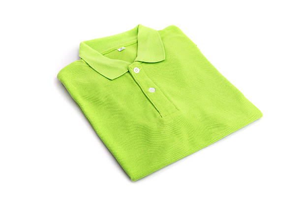 istock Close up green t-shirt isolated on white 603908354
