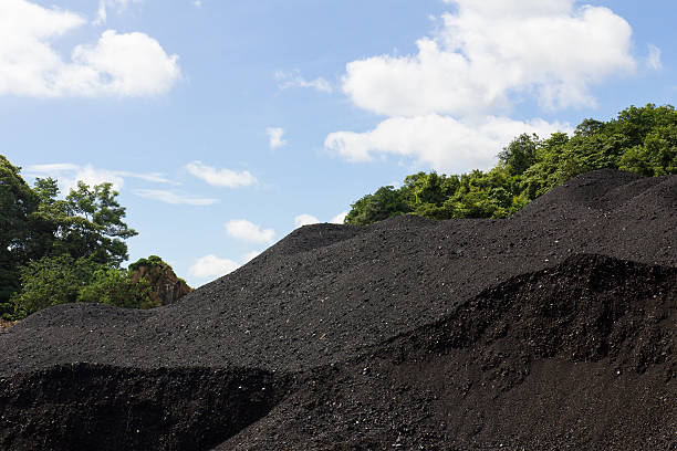 Stockpile of coal Coal Stock pile. used in the industry. hard bituminous coal stock pictures, royalty-free photos & images