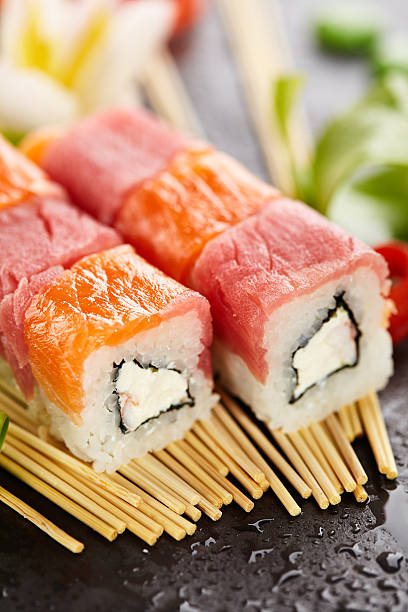 istock Salmon and Tuna Sushi Roll 603911300