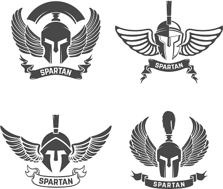 Set of the spartan helmets with wings. Design elements for label, emblem, sign, brand mark. Vector illustration.