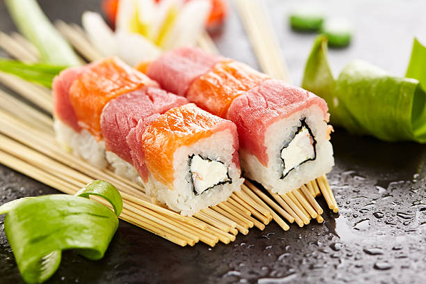 istock Salmon and Tuna Sushi Roll 603911424