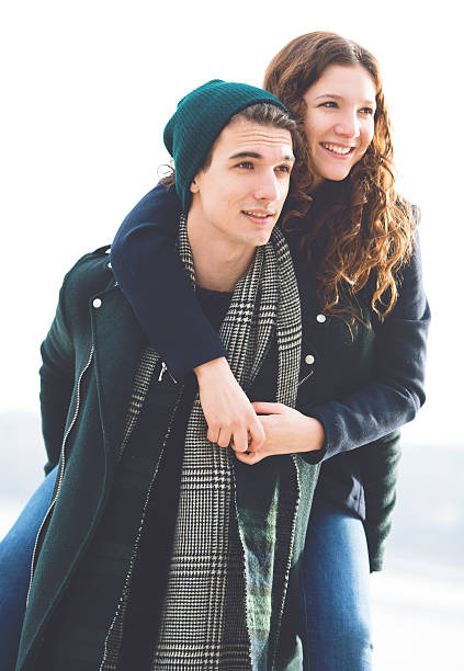 istock Happy young man piggybacking his girlfriend 603985886