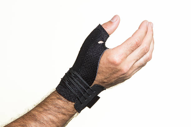 Bandage for the thumb on a man's hand - isolate Bandage for the thumb on a man's hand - isolate on a white background pollex stock pictures, royalty-free photos & images