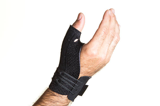 Bandage for the thumb on a man's hand - isolate Bandage for the thumb on a man's hand - isolate on a white background pollex stock pictures, royalty-free photos & images