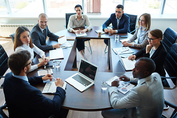 Meeting of shareholders Businespeople at panel discussion in board room meeting room stock pictures, royalty-free photos & images