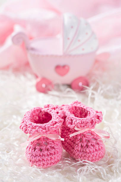 istock Pink baby crochet shoes 603992218