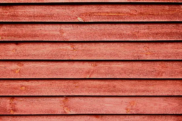 Wall of red wooden planks