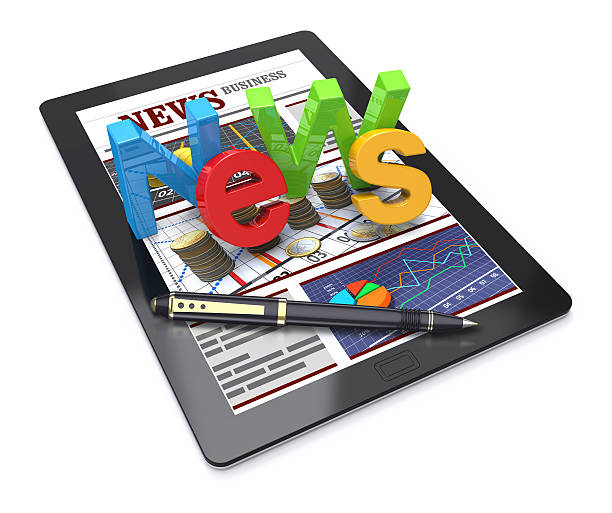 notizie affari finanziari - newspaper the media reading digital display foto e immagini stock