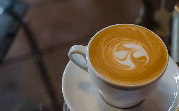istock Barista making a cup of coffee 604003718