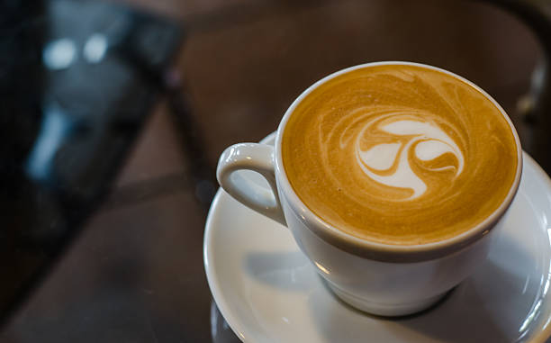 istock Barista making a cup of coffee 604003966