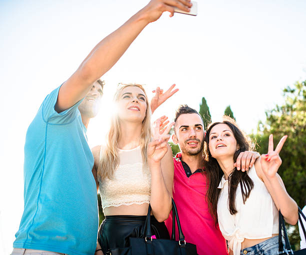istock Happiness multiracial Friends embraced togetherness and take a selfie 604004106
