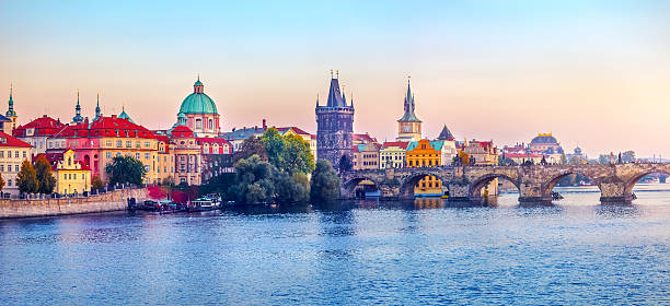 istock Sunset landscape view to Charles bridge on Vltava river in 604005372
