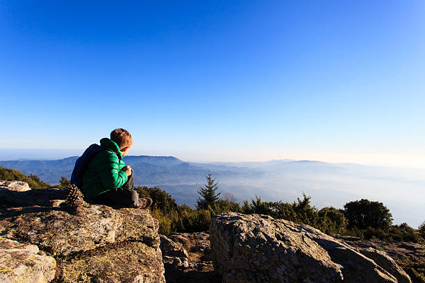 istock little boy hiking in scenic mountains 604006890