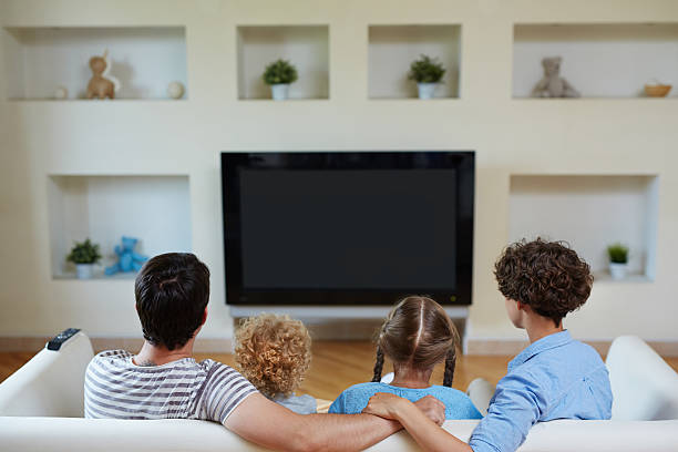 istock What can be better than watching tv with family 604010770