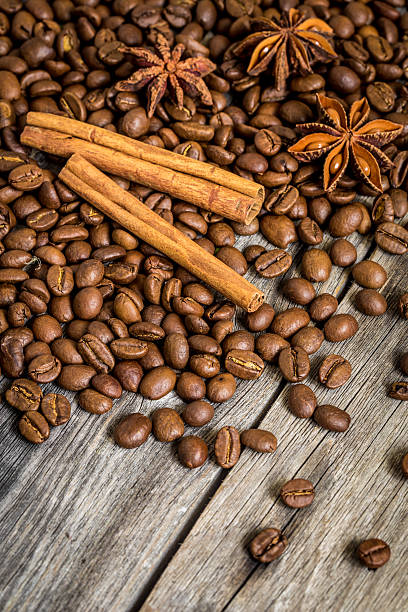 istock Coffee, cinnamon and Damian on wooden background 604011560