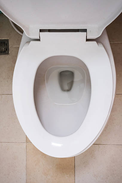 istock Top view, white lavatory, dirty floor 604013494