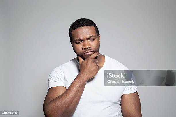Portrait Of Worried Afro American Young Man Stock Photo - Download Image Now - Body Building, Asking, Adult