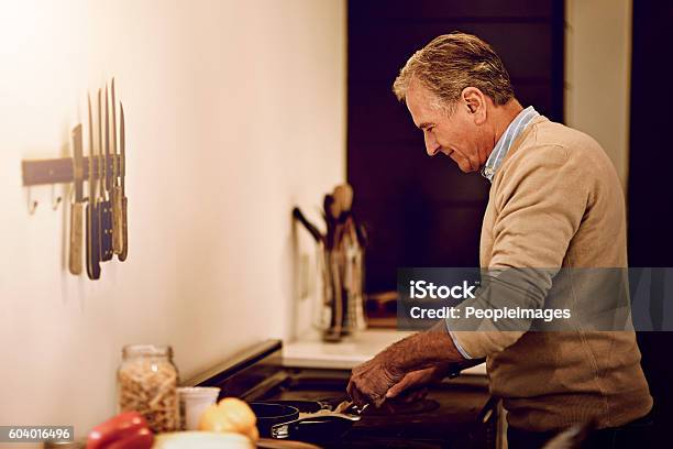 The Kitchen Is His Happy Place Stock Photo - Download Image Now - Active Seniors, Adult, Adults Only