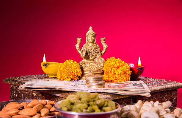 typical diwali celebration or puja in india with diya stock photo