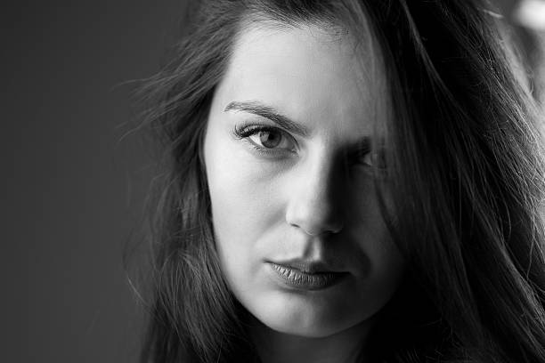 istock Black and white portrait of young lady 604019206