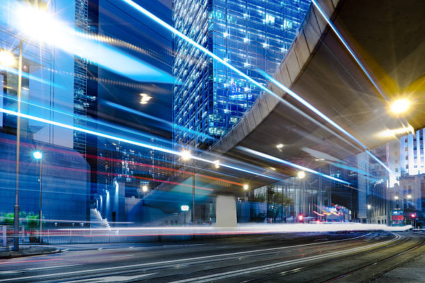 istock blurred traffic in downtown district,hong kong,china 604019870
