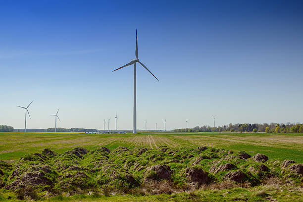 istock Bright blue sky moving and wind turbine 604020222