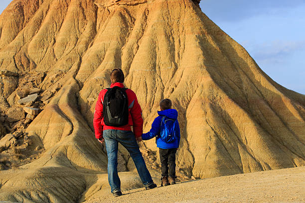 istock father and son travel in scenic mountains 604021248