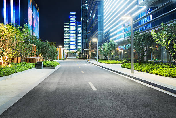 city empty traffic road with cityscape in background