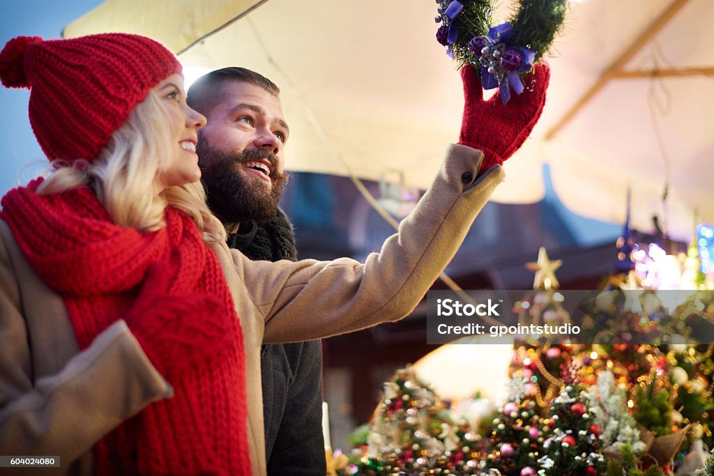 Looking up at christmas wreaths Christmas Market Stock Photo